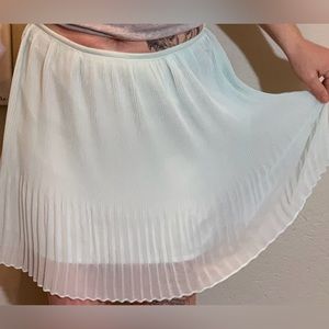 Pale aqua lined/sheer mini skirt.